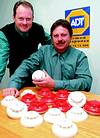 (From left to right) ADT Security national procurement manager, John Cavé and group technical manager, Terry van Zyl, with the company&#8217;s revolutionary new carbon monoxide fire detector
